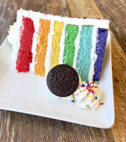 Rainbow Cake Slice From Three Brothers Bakery