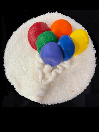 Rainbow colored balloon dipped decorated cookie